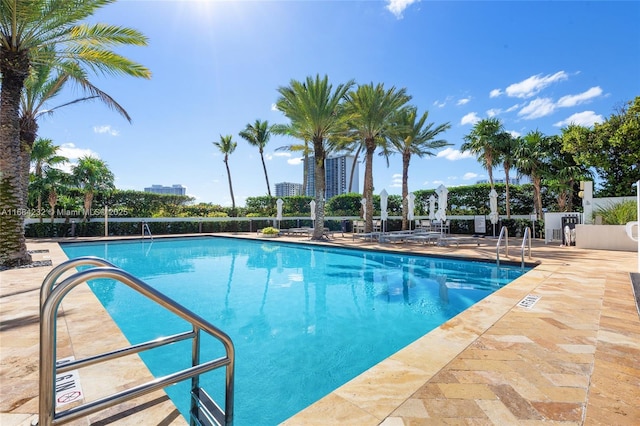 view of swimming pool featuring a patio area