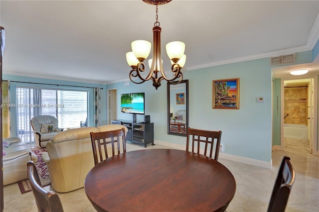 dining area with crown molding, a notable chandelier, and light tile patterned floors