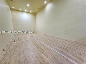 spare room featuring light wood-type flooring