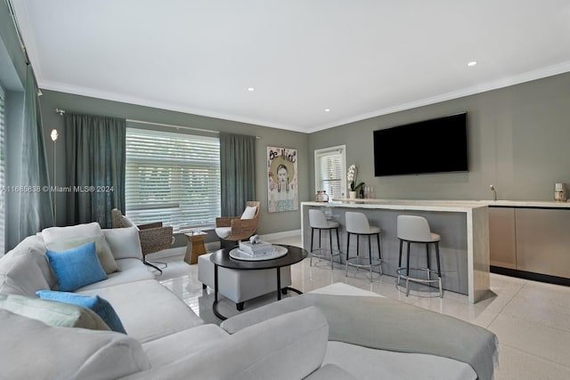 tiled living room with ornamental molding