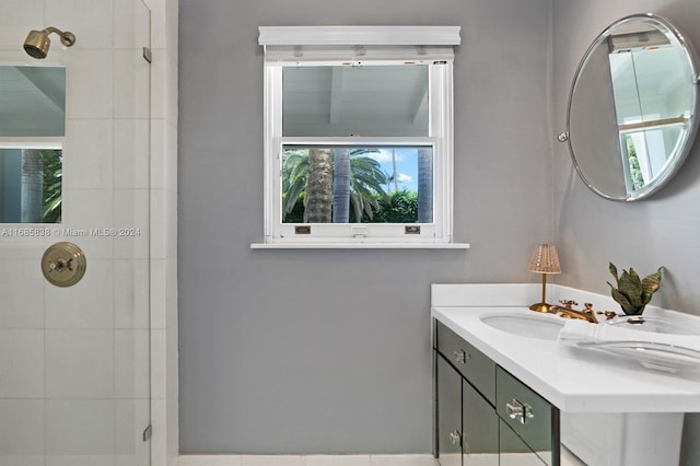 bathroom with vanity and walk in shower