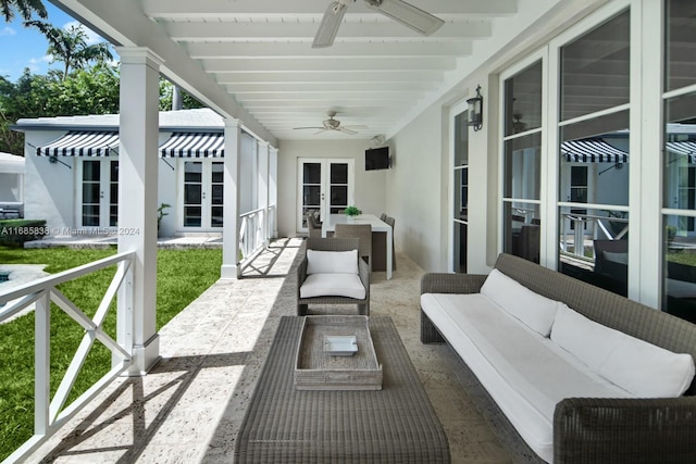 view of patio / terrace with outdoor lounge area, french doors, and ceiling fan