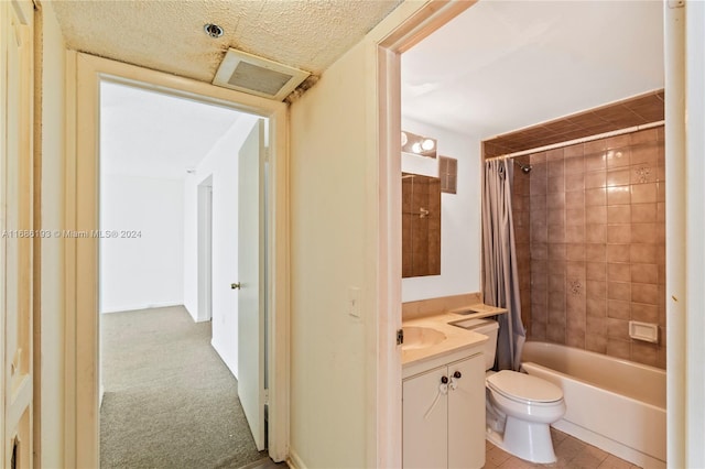 full bathroom with toilet, tile patterned flooring, a textured ceiling, vanity, and shower / tub combo with curtain