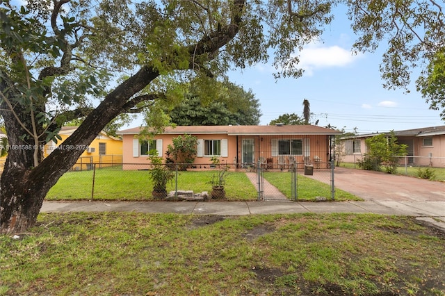 ranch-style home featuring a front yard