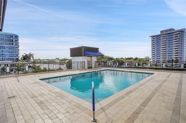 view of pool featuring a patio