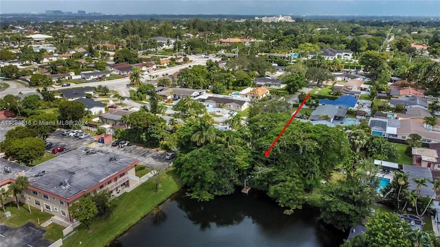 drone / aerial view with a water view