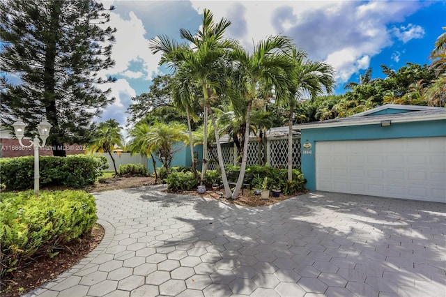 view of front of property with a garage