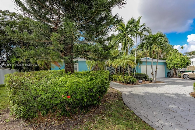 view of front of property with a garage