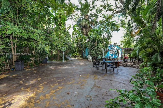 view of patio with a playground