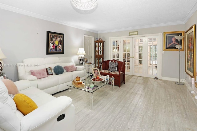 living room featuring french doors, light hardwood / wood-style floors, ornamental molding, and a textured ceiling