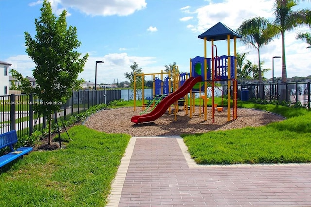 view of play area with a yard