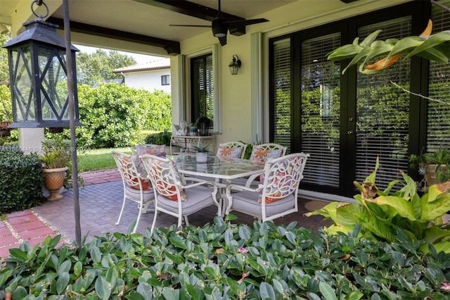 view of patio / terrace featuring ceiling fan