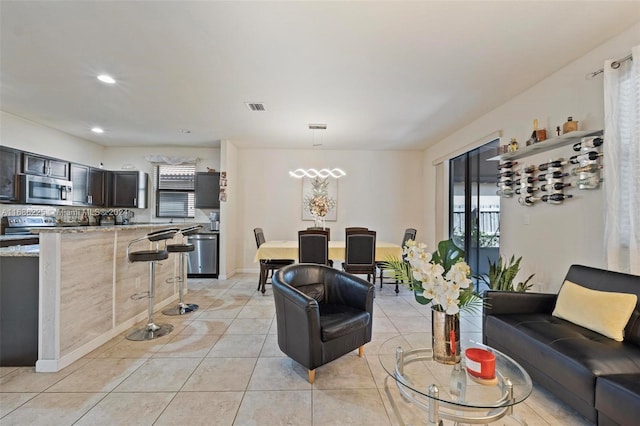 living room featuring light tile patterned floors