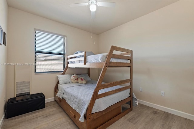 bedroom featuring ceiling fan and light hardwood / wood-style floors