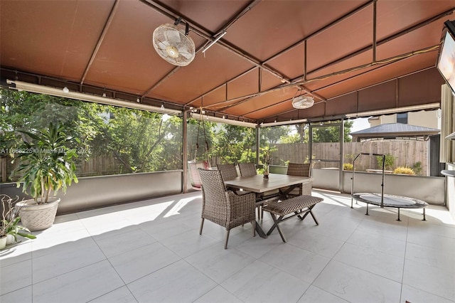 sunroom with vaulted ceiling