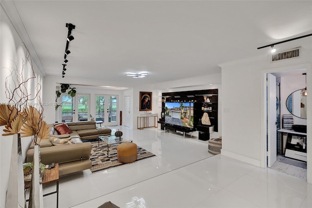 living area with french doors, tile patterned flooring, rail lighting, and visible vents