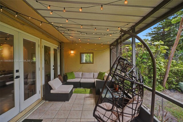 exterior space with outdoor lounge area and french doors