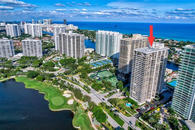 birds eye view of property featuring a water view