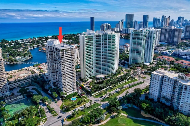 birds eye view of property featuring a water view