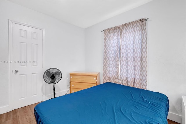 bedroom with wood-type flooring