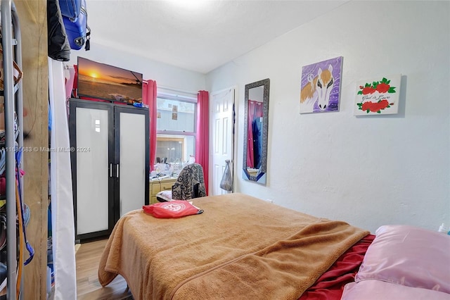 bedroom featuring hardwood / wood-style floors