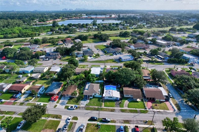 drone / aerial view with a water view