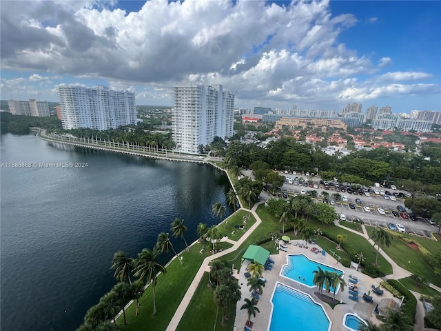 birds eye view of property with a water view