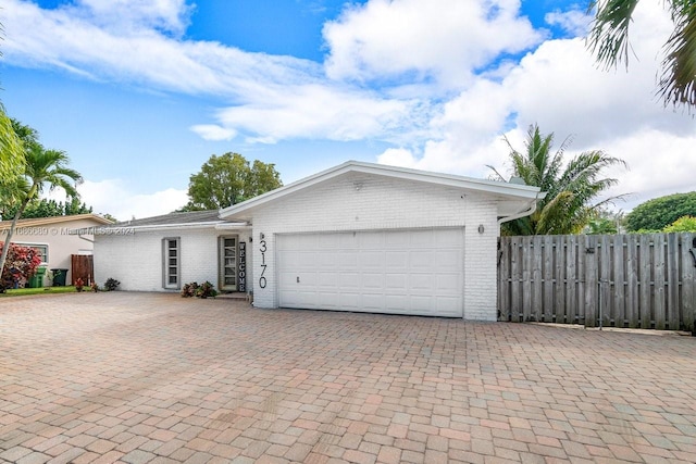 single story home with a garage