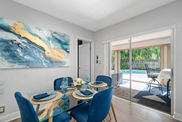 dining room featuring hardwood / wood-style flooring