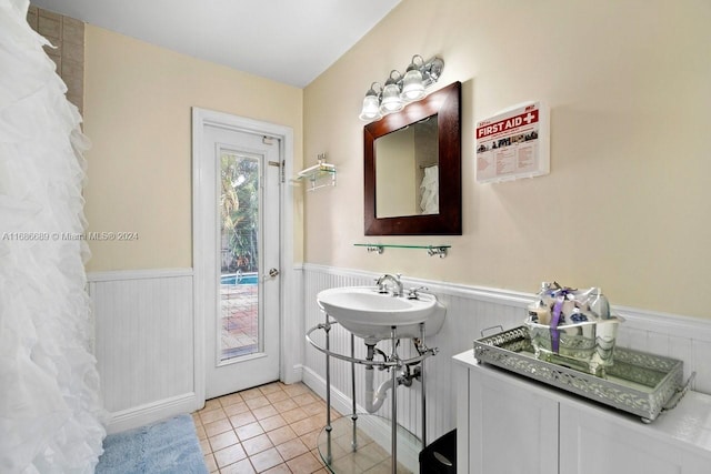 bathroom with tile patterned flooring