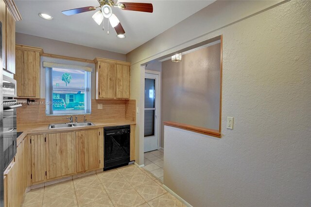 kitchen featuring dishwasher, decorative backsplash, light brown cabinets, and sink