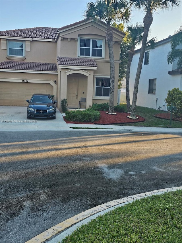 view of front of property with a garage