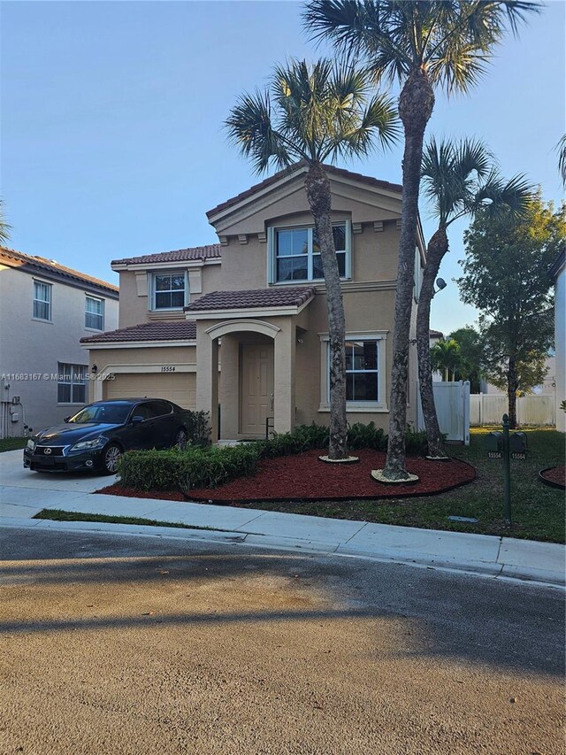 front of property featuring a garage