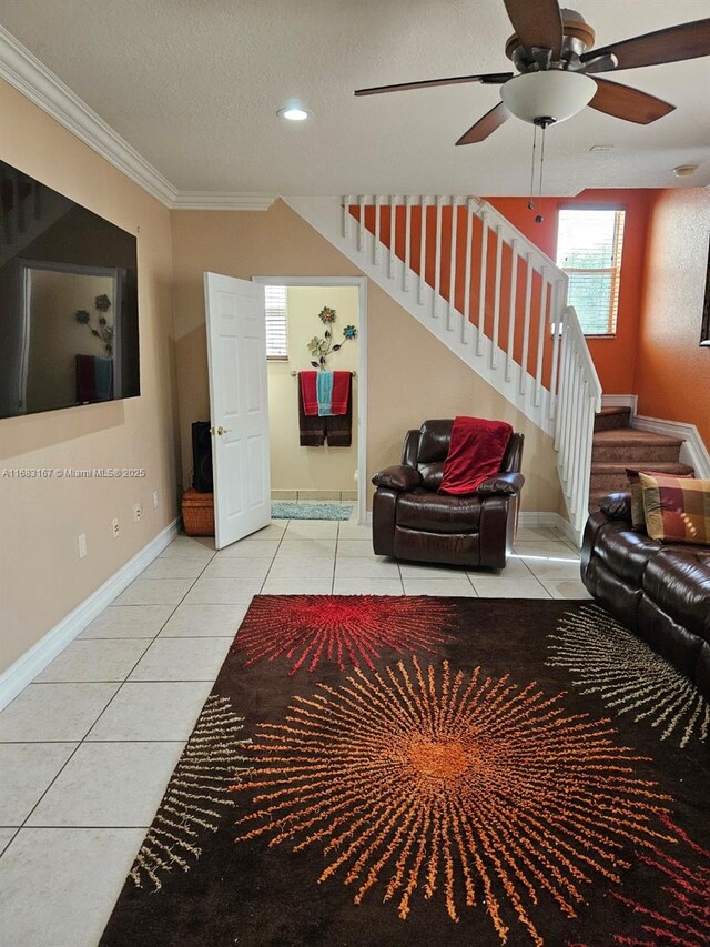 hall with crown molding and light carpet