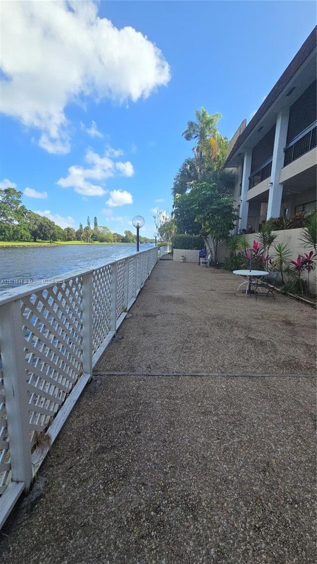 exterior space with a water view