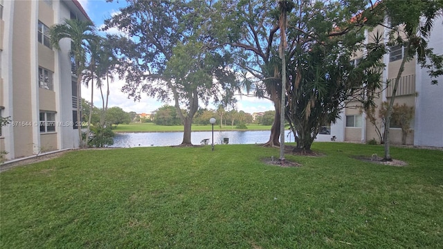 view of yard with a water view