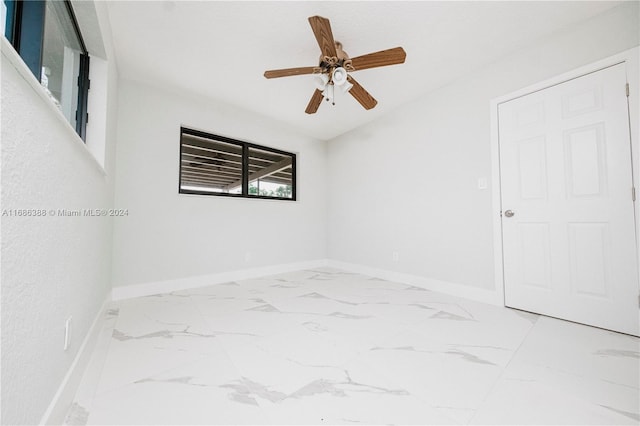 empty room featuring ceiling fan