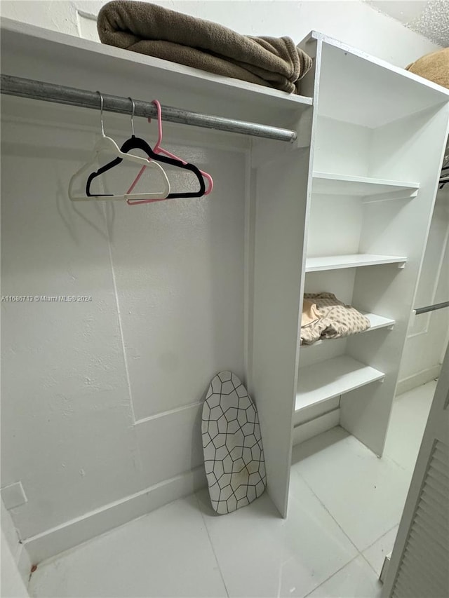 walk in closet featuring tile patterned floors