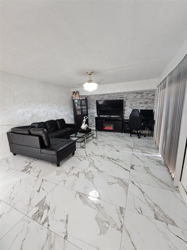 living room with a textured ceiling