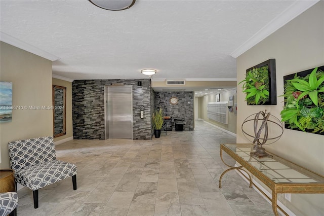 hallway with ornamental molding and elevator