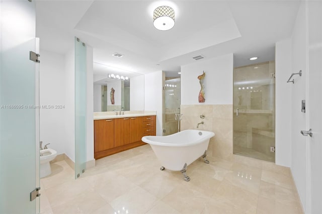 bathroom featuring a bidet, vanity, separate shower and tub, and tile walls