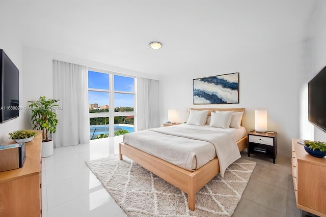 bedroom with light tile patterned flooring