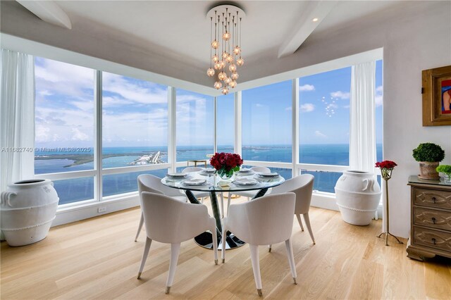 1425 Brickell Ave Unit 55F, Miami, FL 33131 - corridor featuring arched walkways and wood finished floors