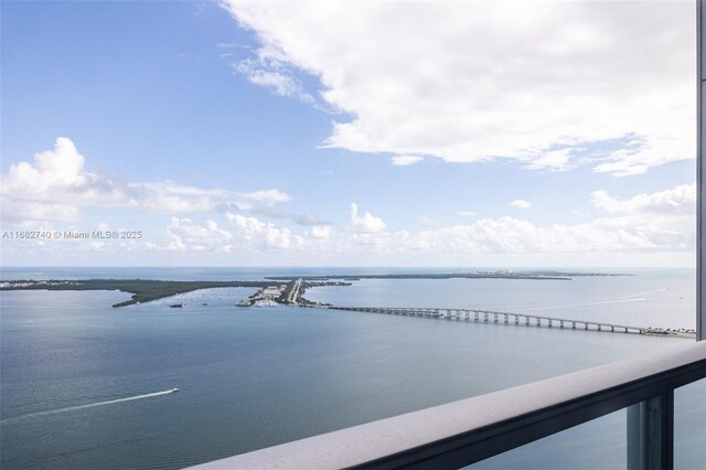 1425 Brickell Ave Unit 55F, Miami, FL 33131 - living room featuring wood finished floors and beam ceiling