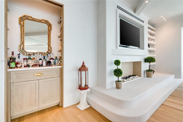 1425 Brickell Ave Unit 55F, Miami, FL 33131 - indoor dry bar with light wood finished floors and recessed lighting