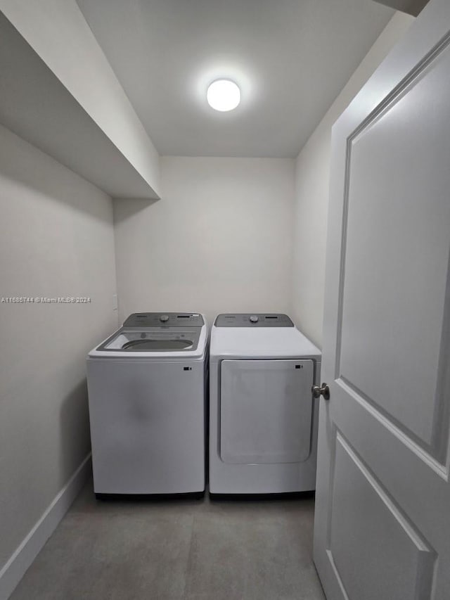 laundry area with washer and clothes dryer