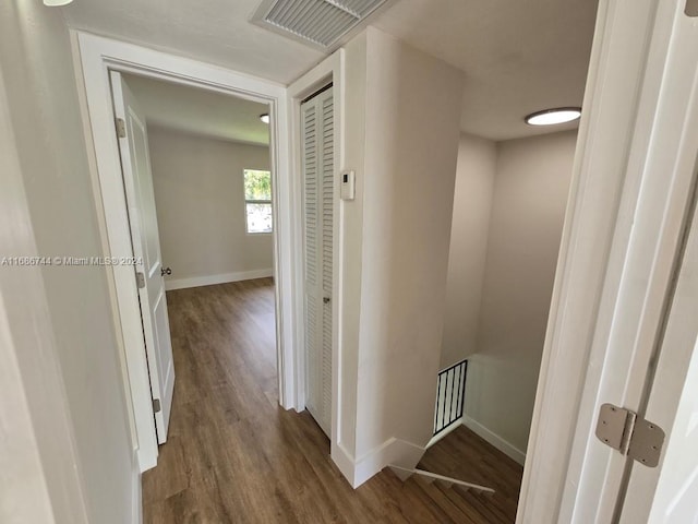 corridor featuring hardwood / wood-style flooring