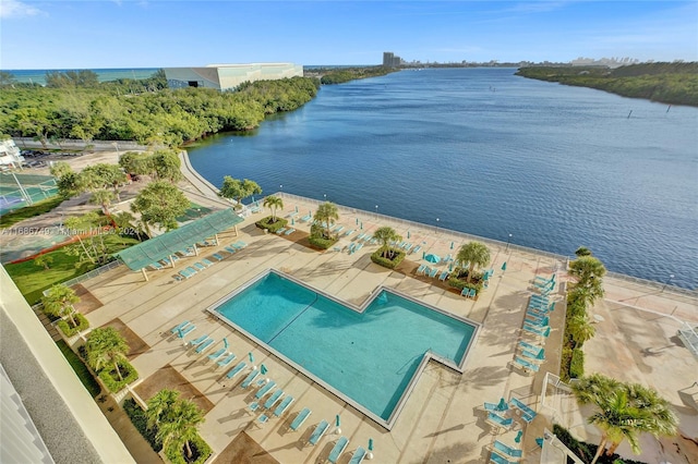 birds eye view of property with a water view