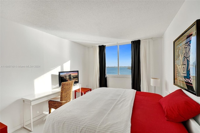 bedroom featuring a textured ceiling