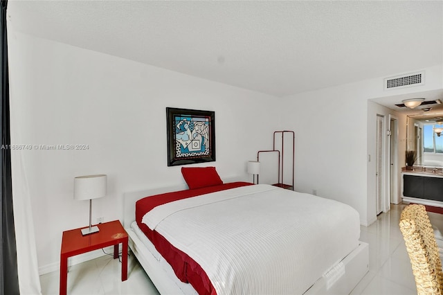 bedroom featuring ensuite bathroom